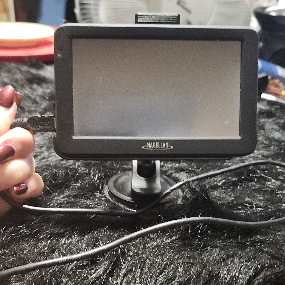 Magellan RoadMate Black GPS Navigation Device . Used
